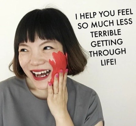 Simone laughing with red paint smeared on her cheek, text overlay: I help you feel so much less terrible getting through life!